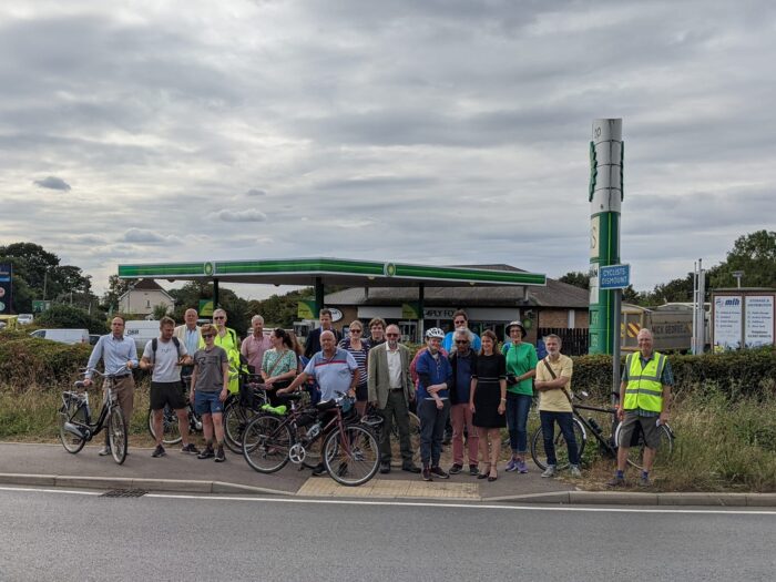 BP roundabout (002) Group of people outside the BP station